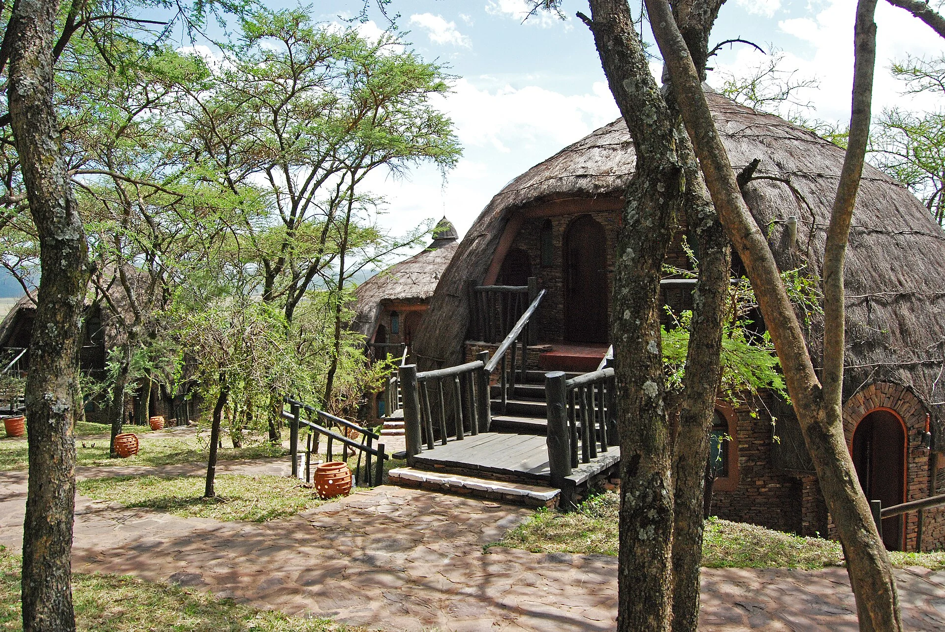 Thatched stone buildings at Serengeti Serena Safari Lodge